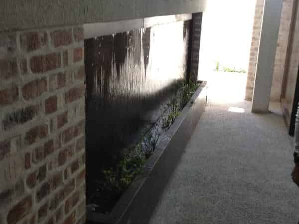 Prefab corten cladded wetwall - Clifton