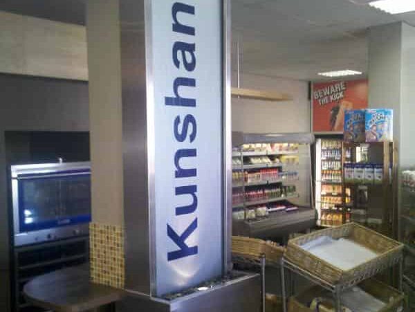 Prefab plexiglass wetwall fix onto column for Kunshani Motors - Claremont